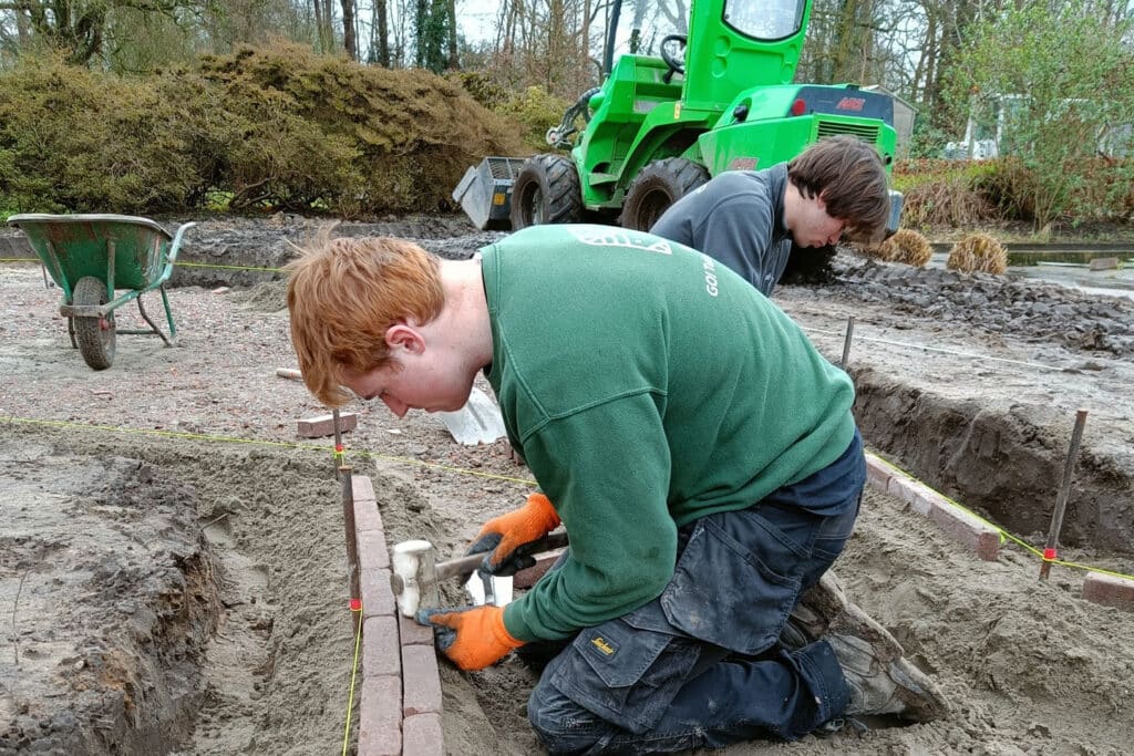 Waterdoorlatende bestrating in Passietuin Tectura Melle: harmonie tussen natuur en innovatie 1