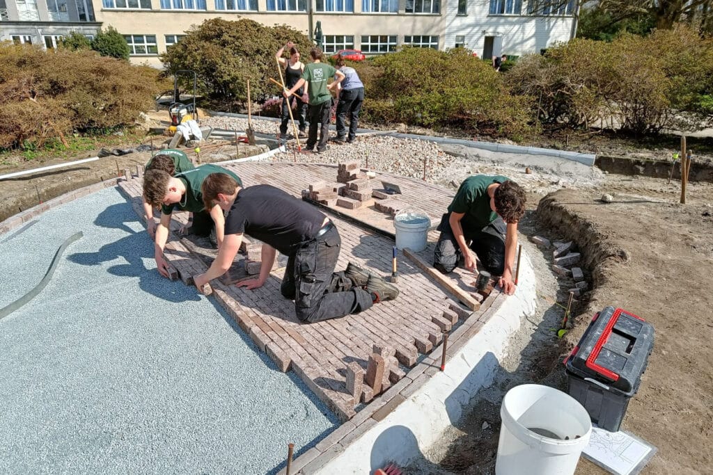 Waterdoorlatende bestrating in Passietuin Tectura Melle: harmonie tussen natuur en innovatie 3